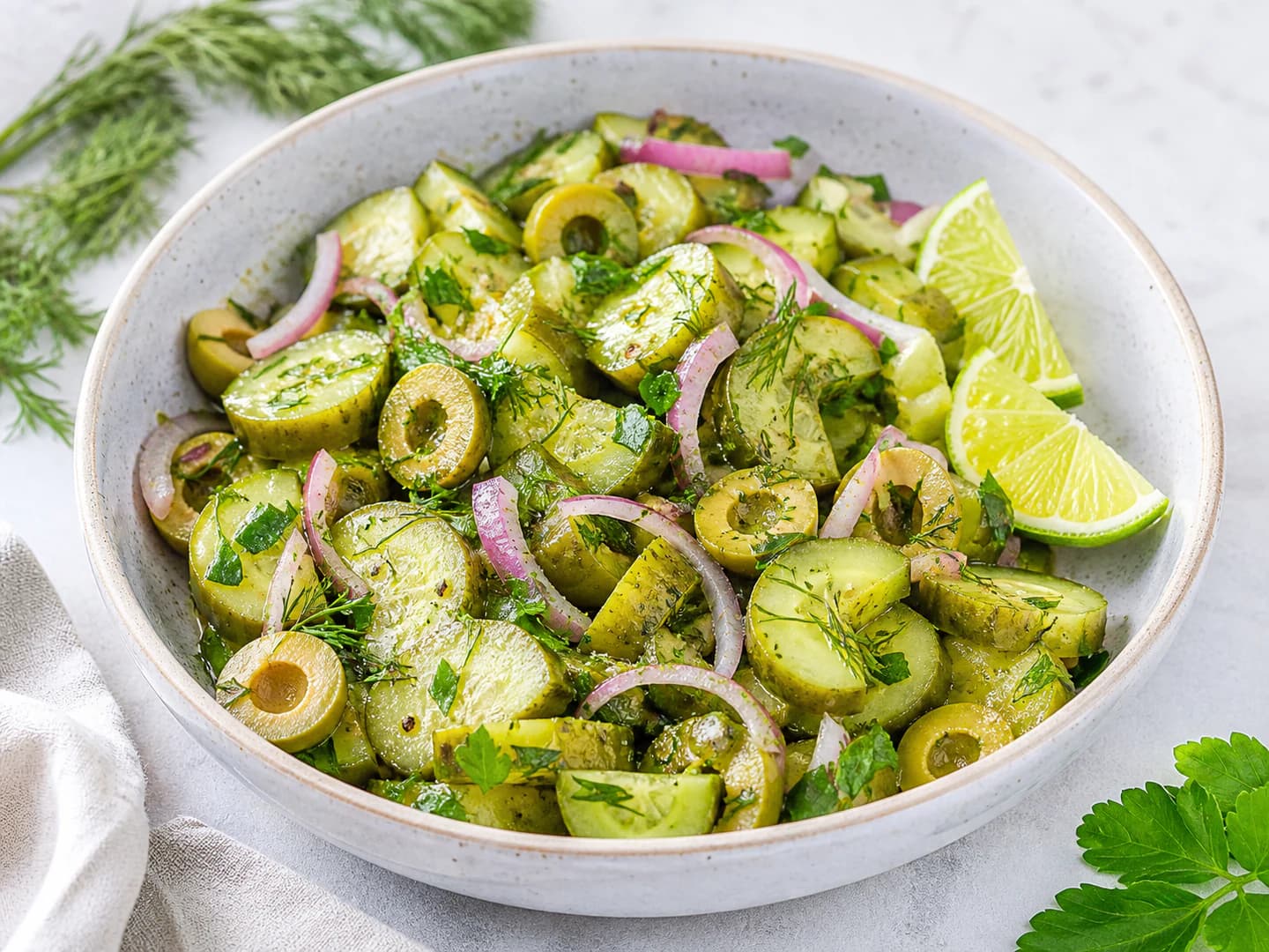 Pickled cucumber and olive salad with lime dressing